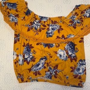 This cute floral yellow/orange top!